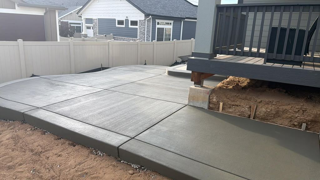 Concrete patio by deck, Denver Metro, CO